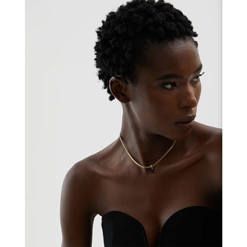 Nova Glow - Gold Flat Snake Necklace with Green Crystal