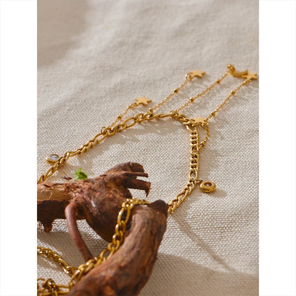 Trickling Down - Gold Moon and Stars Necklace